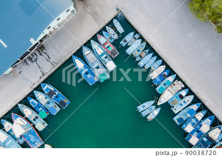 Aerial view of boat at Fuvahmulah Harbour, Maldives Aerial view of boat at Fuvahmulah Harbour, Maldives 90038720
