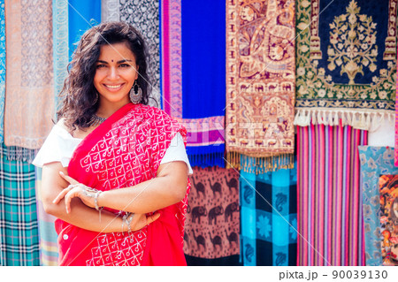 business lady in red traditional sari and jewelery clothes shop owner cashmere yak wool shawls Delhi market.female seller in goa india arambol sale shop.designer seamstress tailor girl in Arambol Goa business lady in red traditional sari and jewelery clothes shop owner cashmere yak wool shawls Delhi market.female seller in goa india arambol sale shop.designer seamstress tailor girl in Arambol Goa 90039130