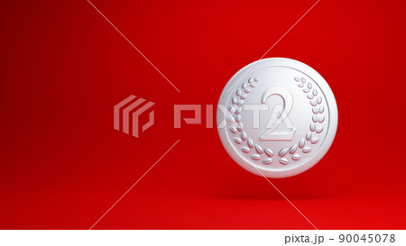 赤い背景に2と書かれた銀色のメダル。 90045078
