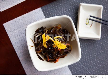 Appetizing seaweed salad. Japanese cuisine Appetizing seaweed salad. Japanese cuisine 90048970
