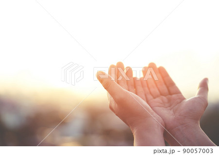 Human hands open palm up worship Praying with faith and belief in God of an appeal to the sky. Concept Religion and spirituality with believe Power of hope or love and devotion. filler tone vintage. Human hands open palm up worship Praying with faith and belief in God of an appeal to the sky. Concept Religion and spirituality with believe Power of hope or love and devotion. filler tone vintage. 90057003