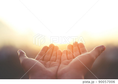 Human hands open palm up worship Praying with faith and belief in God of an appeal to the sky. Concept Religion and spirituality with believe Power of hope or love and devotion. filler tone vintage. 90057006