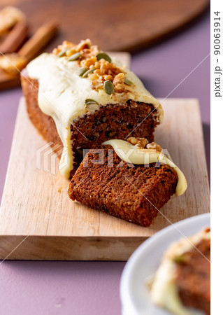 Sliced carrot cake on cutting board. Sliced carrot cake on cutting board. 90063914