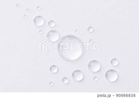 Water drops on white background. Abstract drops of gel. Face serum cosmetics. 90066838