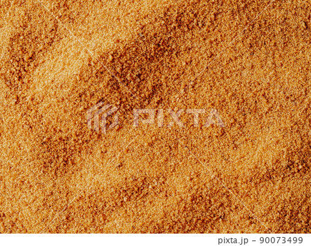 Raw coconut sugar texture background 90073499