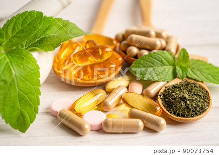 Alternative medicine herbal organic capsule with vitamin E omega 3 fish oil, mineral, drug with herbs leaf natural supplements for healthy good life. Alternative medicine herbal organic capsule with vitamin E omega 3 fish oil, mineral, drug with herbs leaf natural supplements for healthy good life. 90073754