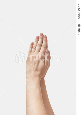 Two hands pray gesture isolated on white Two hands pray gesture isolated on white 90073977