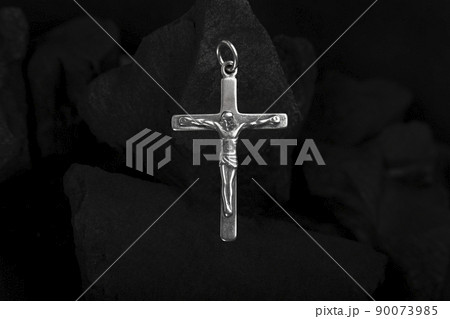 Silver crucifix necklace cross on pieces of coal. 90073985