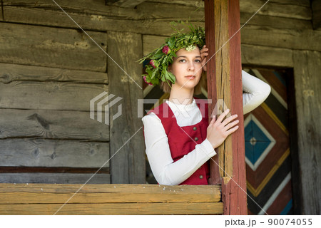 Latvian woman in traditional clothing. Ligo folk. Latvian woman in traditional clothing. Ligo folk. 90074055