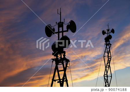 Air defense radars of military mobile anti aircraft systems, modern army industry on the background of the sunset orange sky, Russia Air defense radars of military mobile anti aircraft systems, modern army industry on the background of the sunset orange sky, Russia 90074188