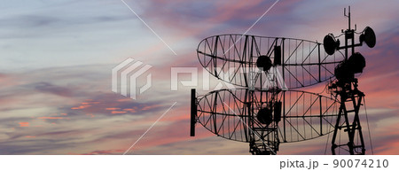 Air defense radars of military mobile anti aircraft systems, modern army industry on the background of the sunset orange sky, Russia Air defense radars of military mobile anti aircraft systems, modern army industry on the background of the sunset orange sky, Russia 90074210