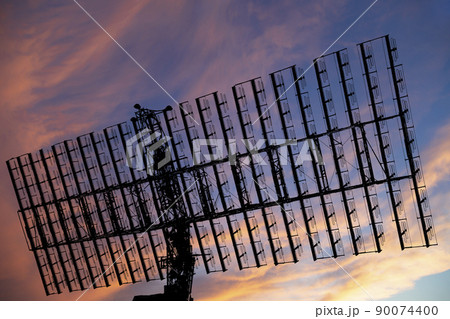 Air defense radars of military mobile anti aircraft systems, modern army industry on the background of the sunset orange sky, Russia 90074400