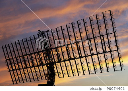 Air defense radars of military mobile anti aircraft systems, modern army industry on the background of the sunset orange sky, Russia 90074401
