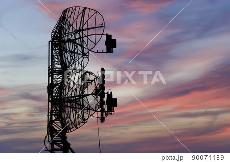 Air defense radars of military mobile anti aircraft systems, modern army industry on the background of the sunset orange sky, Russia 90074439