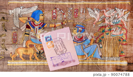 Page of the passport with the visa Egypt Hurghada International Airport on the background of the papyrus 90074788