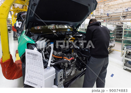 Car bodies are on assembly line. Factory for production of cars. Modern automotive industry. A car 90074883