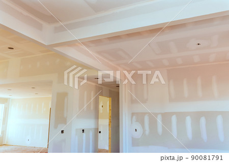 Finishing putty in the room walls on apartment renovation house remodeling new house empty apartment room 90081791