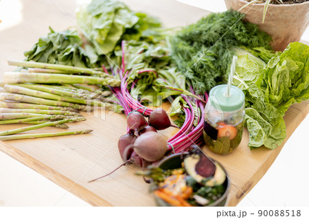 Table full of fresh food ingredients Table full of fresh food ingredients 90088518