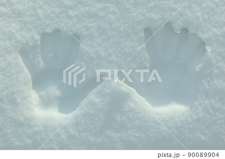 two palm prints on the snow.photo with copy space 90089904