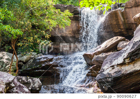 Tropical waterfall in rain forest 90090627