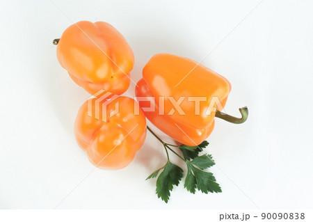 paprika,lettuce and parsley on a white background. paprika,lettuce and parsley on a white background. 90090838
