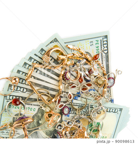 Gold jewelry and dollars isolated on white . Place for your text. 90098613