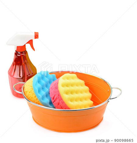Foam sponge and spray gun isolated on white background. Place for your text. Foam sponge and spray gun isolated on white background. Place for your text. 90098665