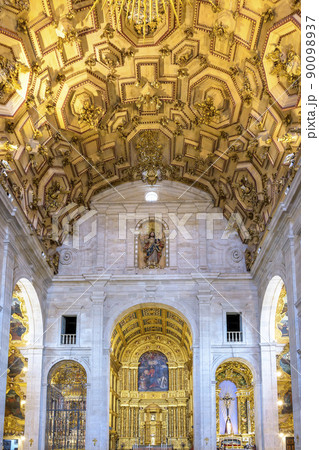 Historic baroque church interiors decorated with gold Historic baroque church interiors decorated with gold 90098937