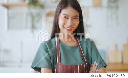Beautiful female smiling and looking at camera feeling confident Beautiful female smiling and looking at camera feeling confident 90100120