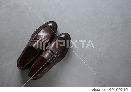 Classic male brown leather shoes. Top view. Flat lay. Classic male brown leather shoes. Top view. Flat lay. 90100216