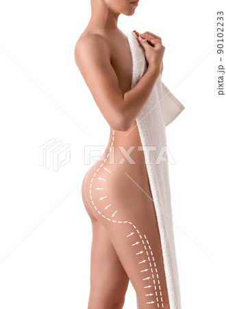 Female body with the drawing arrows on it isolated on white. Fat lose, liposuction and cellulite removal concept. 90102233