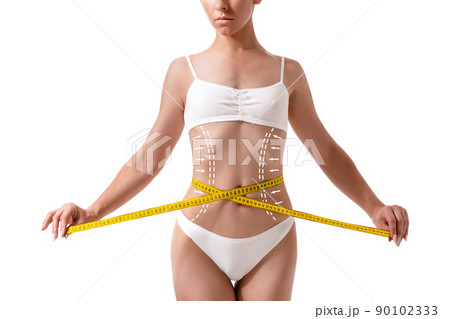 Female body with the drawing arrows on it isolated on white. Fat lose, liposuction and cellulite removal concept. Female body with the drawing arrows on it isolated on white. Fat lose, liposuction and cellulite removal concept. 90102333
