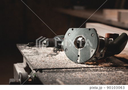 Carpenter's hand tool on the table on the background of wood shavings Carpenter's hand tool on the table on the background of wood shavings 90103063