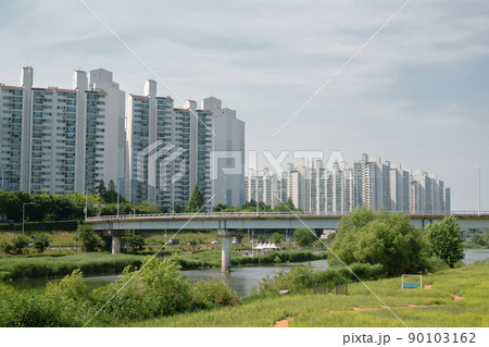 Jungnangcheon Stream park and apartment buildings in Seoul, Korea Jungnangcheon Stream park and apartment buildings in Seoul, Korea 90103162