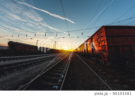 High-speed train moves by rail, delivery of goods by freight train. Train carriages at the station 90103381