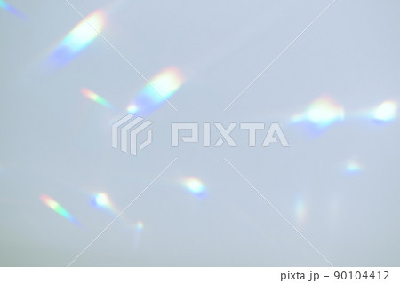 Blurred rainbow light refraction texture on white wall Blurred rainbow light refraction texture on white wall 90104412