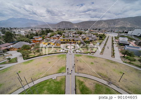 The Mitad del Mundo in Quito Ecuador during an overcast day 90104605