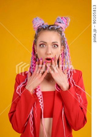 Funny young woman portrait with emotion of surprising and wondering. 90105813