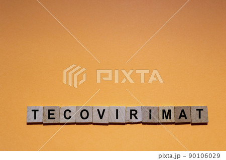 Tecovirimat. Antiviral Tecovirimat. Tpoxx brand. Medication to treat monkeypox. Smallpox. Horizontal design. Text written in square wooden letters. Symptoms, Pox. Tecovirimat. Antiviral Tecovirimat. Tpoxx brand. Medication to treat monkeypox. Smallpox. Horizontal design. Text written in square wooden letters. Symptoms, Pox. 90106029