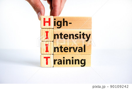HIIT high-intensity interval training symbol. Concept words HIIT high-intensity interval training on blocks on a beautiful white background. HIIT high-intensity interval training concept. Copy space. 90109242