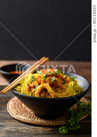 Noodle mixed with spicy tomatoes sauce, Tai Yai food in Northern of Thailand 90116005