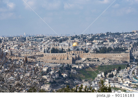 Jerusalem old city, holy mountain. Jerusalem of Gold under cloudy sky - old town view from Mount of Olives 90116183