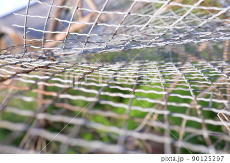 metal mesh perspective handmade background 90125297