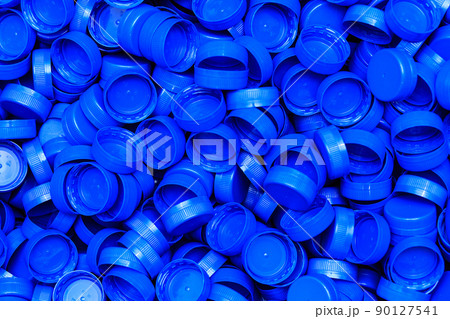 Background of new blue carved plastic caps 90127541