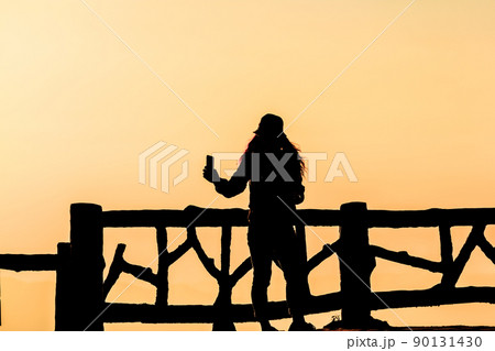 Silhouette of people having fun Silhouette of people having fun 90131430