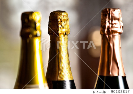 Bottles of champagne on a table. High quality photo. 90132817