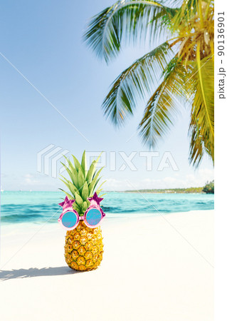 Funny pineapple face in funky glasses on vacation Funny pineapple face in funky glasses on vacation 90136901