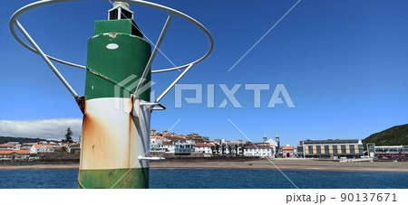 White-green lighthouse on the pier White-green lighthouse on the pier 90137671