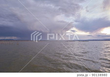Landscape of a lake with storm clouds 90138980