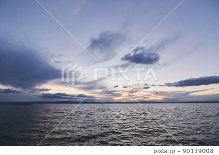 Landscape of a lake with storm clouds 90139008